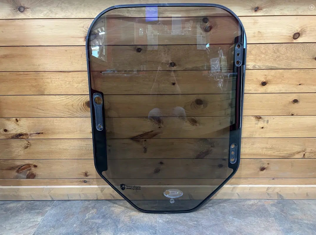 Why polycarbonate skid steer door - forestry and land clearing protection