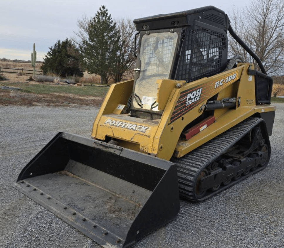ASV PosiTrack RC100 tracked skid steer loader shown outdoors, compatible machine for windshield replacement part #0402-881