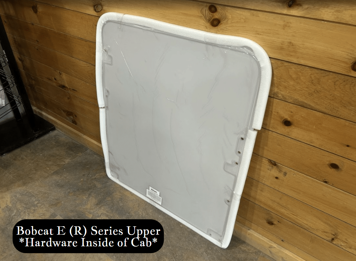 Bobcat E (R) Series upper excavator windshield side angle view showing white foam perimeter seal and hardware mounting points