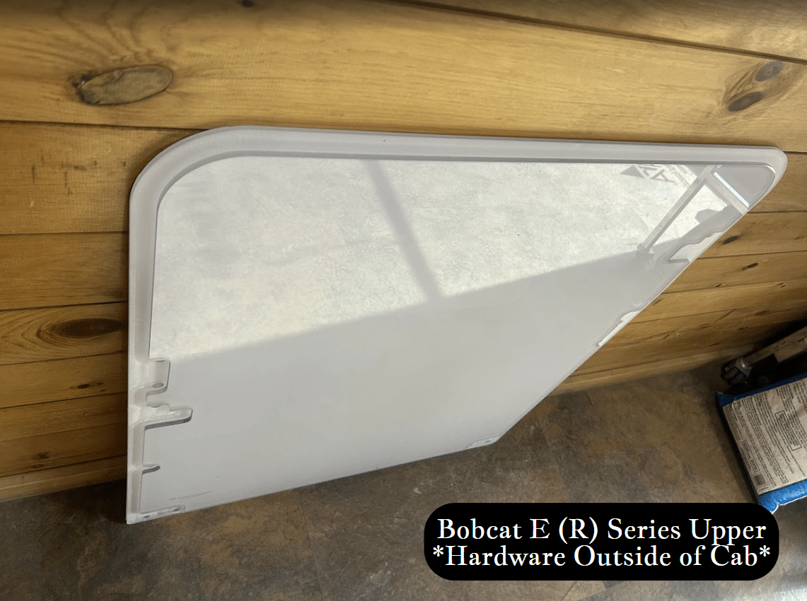 Angled profile view of Bobcat E (R) Series upper windshield exterior showing outside hardware clips and bracket along bottom edge