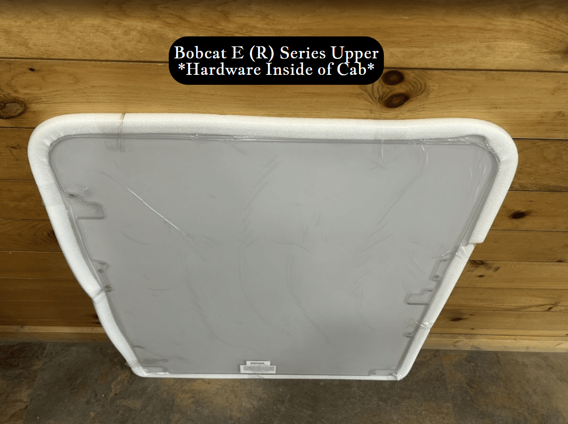 Full front view of Bobcat E (R) Series upper excavator windshield showing interior side with white foam perimeter seal