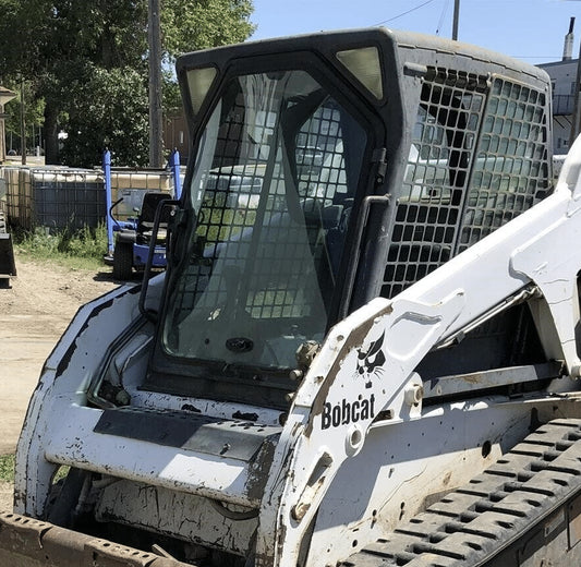 White Bobcat G Series skid steer with cab door open showing original OEM glass windshield before replacement