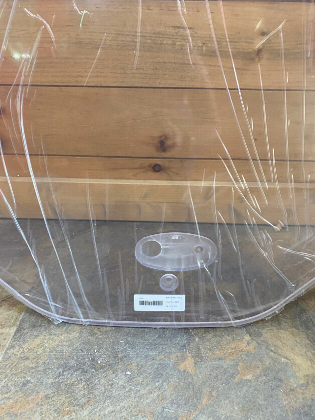 Bobcat M Series clear polycarbonate windshield, bottom view showing latch handle mount hardware and product label