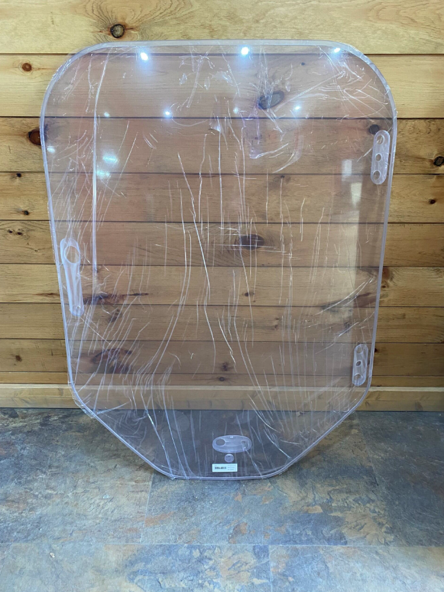 Bobcat M Series clear 1/4-inch polycarbonate windshield, centered front view with mounting hardware visible
