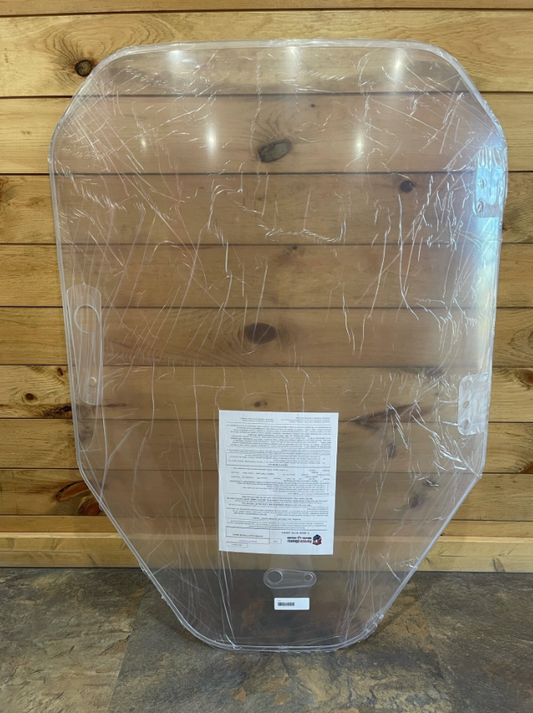 Clear polycarbonate windshield replacement for Bobcat R Series skid steer, shown with protective film