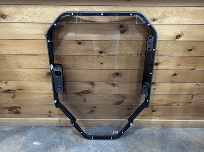 Bobcat S86 T86 R Series skid steer windshield frame replacement - front view with black frame and clear polycarbonate glass