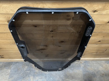 Bobcat S86 T86 R Series windshield replacement with tinted dark glass and black frame - tinted variant front view
