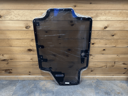 Case/New Holland SR/TR/SV/TV Series tinted polycarbonate forestry door replacement with black rubber frame, full front view