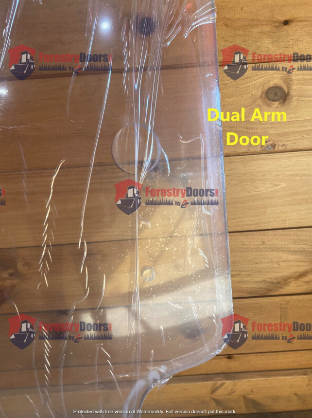 Close-up of Case SR TR SV TV Series dual arm door polycarbonate windshield hinge area with protective film on wooden surface