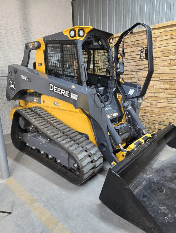 John Deere 331P compact track loader in dealership showing machine the windshield frame replacement fits