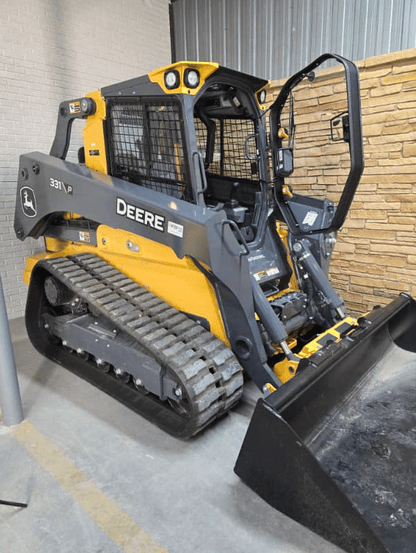 John Deere 331P compact track loader in dealership showing machine the windshield frame replacement fits