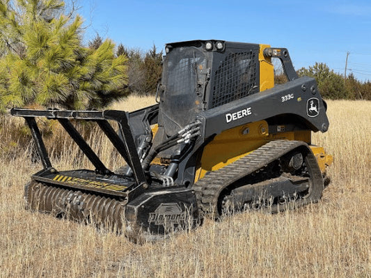 John Deere 333G compact track loader in a field, showing the machine this windshield is designed to fit