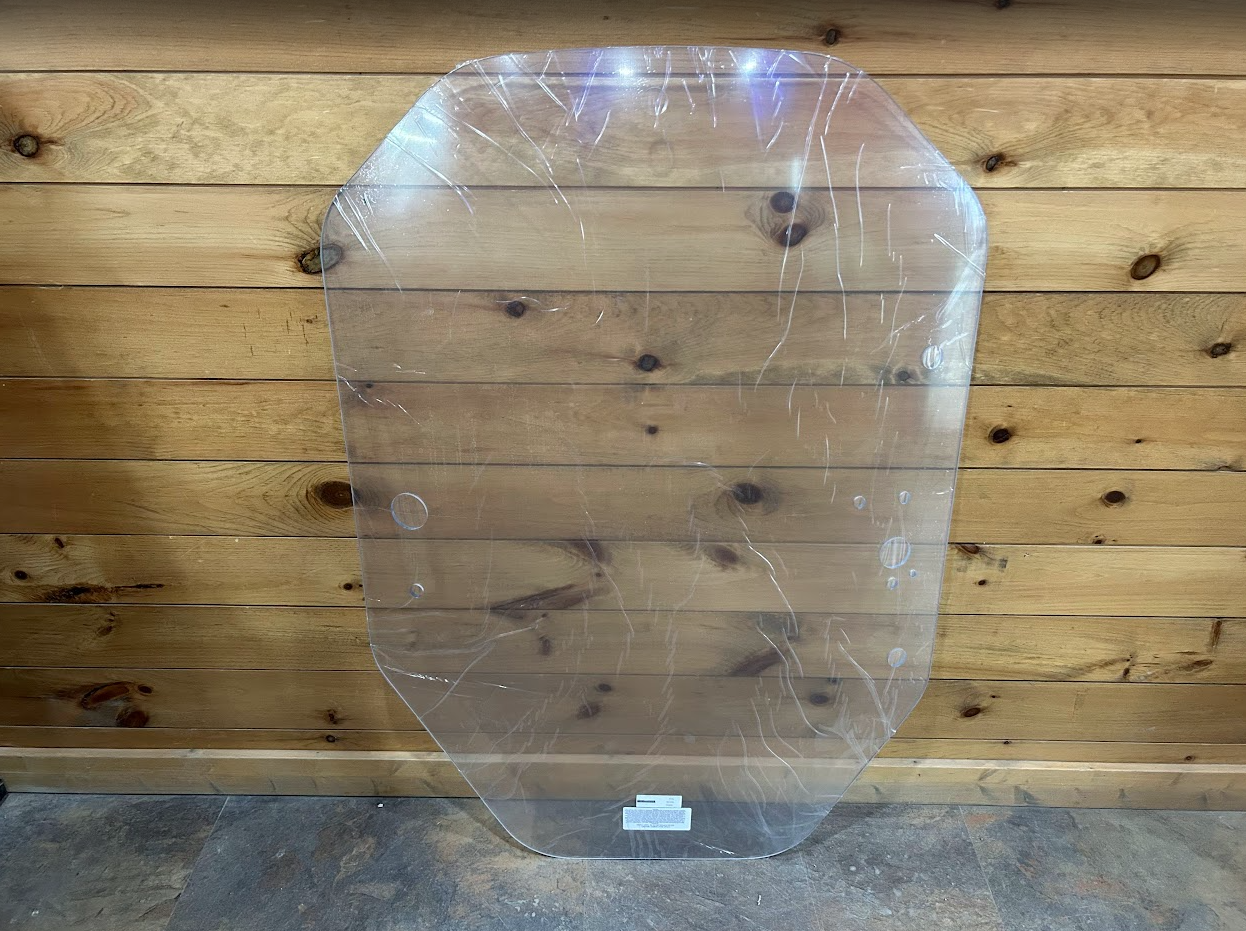 John Deere P Series shield-shaped polycarbonate windshield front view with protective wrapping