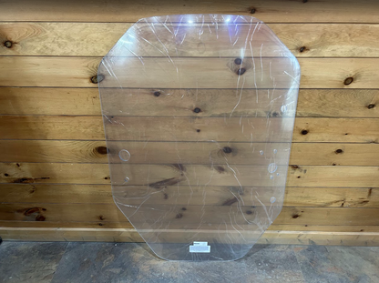 John Deere P Series shield-shaped polycarbonate windshield front view with protective wrapping