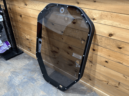 John Deere P Series tinted windshield frame assembly side view with latch hardware visible