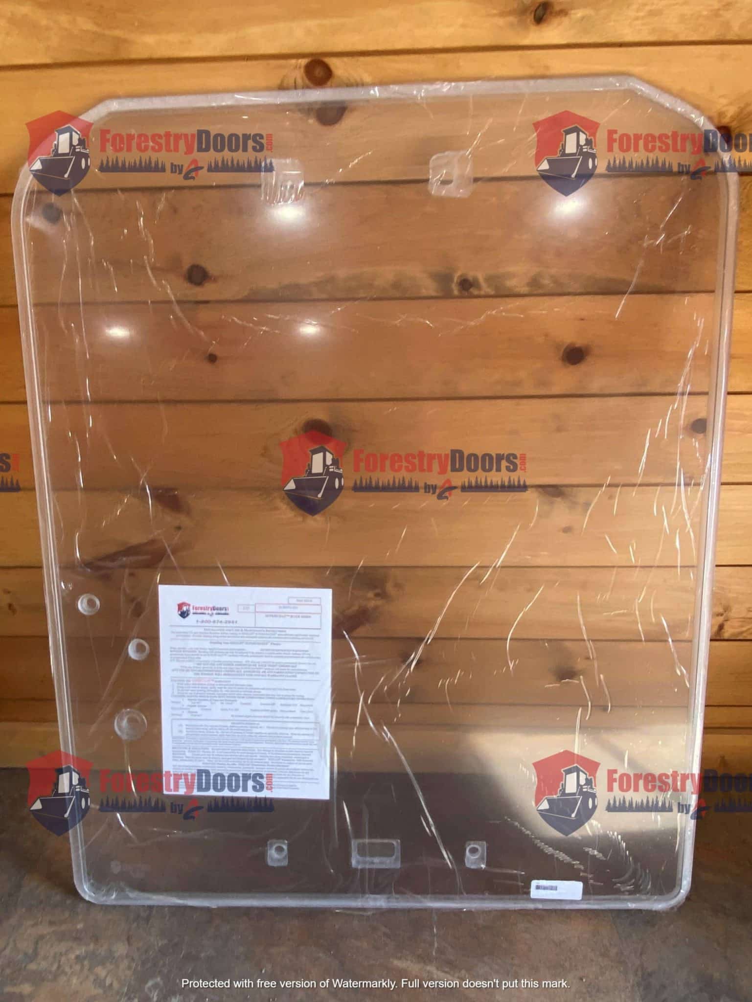 Kubota SSV65 SSV75 polycarbonate front windshield replacement panel with Forestry Doors branding, front view