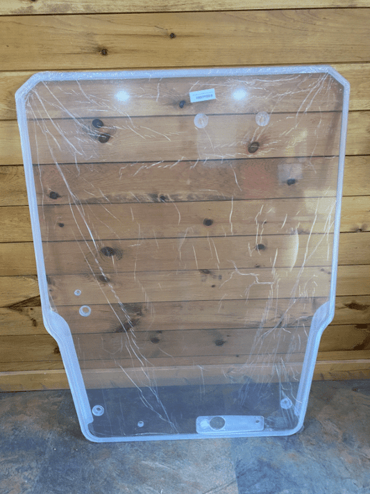 Takeuchi TL series clear polycarbonate windshield replacement panel with protective film, front view