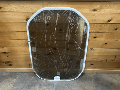 Wacker Neuson ST/SW tinted polycarbonate windshield replacement shown from the front with protective film